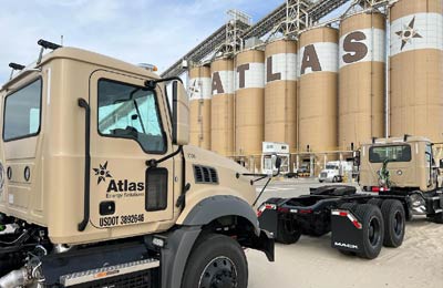 Atlas Energy Trucks going through the sand silos